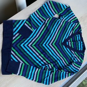 Blue striped sweater.